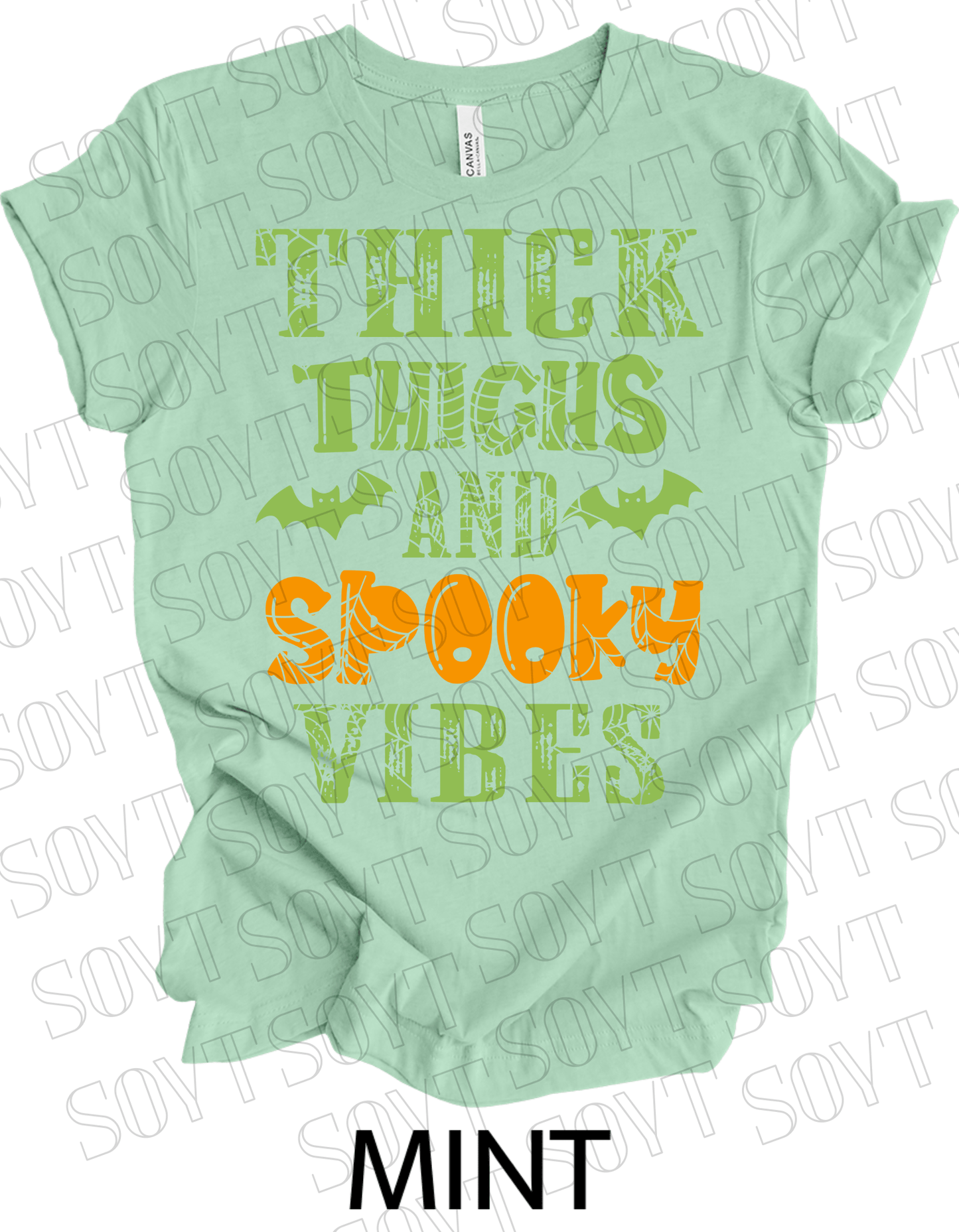 "Thick Thighs and Spooky Vibes" T-Shirt – Halloween Spiderweb & Bat Graphic Tee - Festive Apparel StoreMint