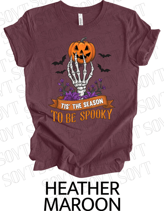 "Tis’ the Season to Be Spooky" Halloween T-Shirt – Skeleton Hand, Pumpkin & Floral Graphic Tee - Festive Apparel StoreHeather Maroon