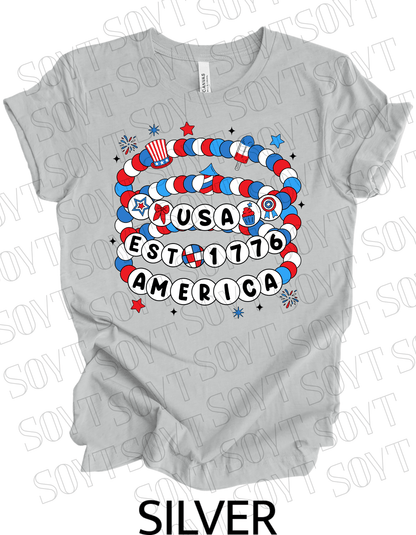 USA Beaded Bracelet Tee – EST 1776 America Graphic Shirt | Patriotic 4th of July Aesthetic - Festive Apparel StoreSilver