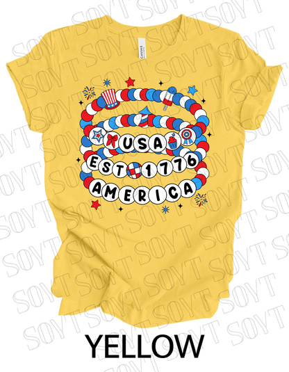USA Beaded Bracelet Tee – EST 1776 America Graphic Shirt | Patriotic 4th of July Aesthetic - Festive Apparel StoreYellow
