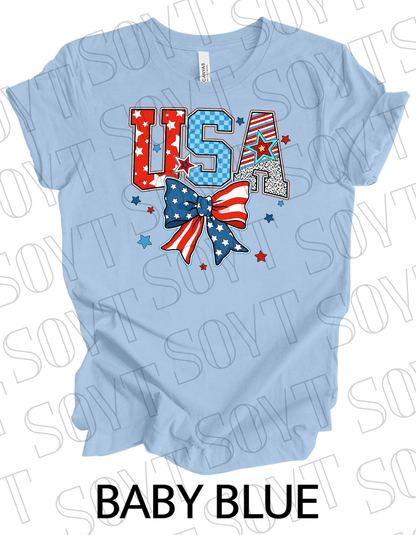 USA Patch Letter T-Shirt – Bella+Canvas Patriotic Bow Graphic Tee - Festive Apparel StoreBaby Blue
